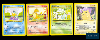 Quatre cartes Pokémon différentes sont représentées sur un fond noir.