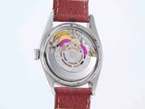 an image of a close up of a watch on a white surface