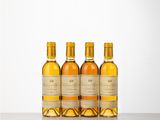 three bottles of wine sitting on top of a table next to each other