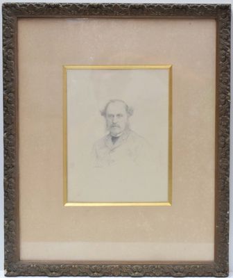 a drawing of a man in a suit and tie in a gold frame