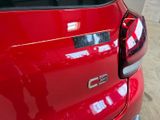 a close up of a red car ' s tail light