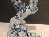 a figurine of a lion on a table