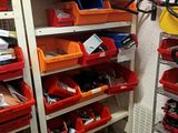 many bins of assorted items on the shelves