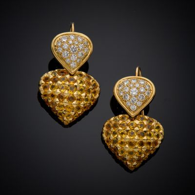 a pair of yellow sapphire and diamond earrings