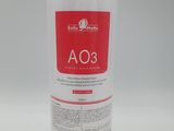 a white bottle with a red label on it sitting on a white surface
