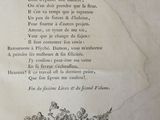 a poem written in french on a piece of paper