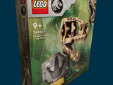a box that has a lego t - rex in it