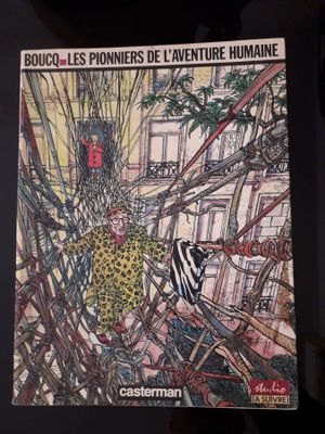 la couverture d'une bande dessinée sur laquelle figure un homme entouré de fils électriques