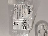 a plastic bag with a piece of paper and a mouse on it