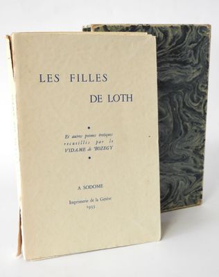 two books sitting next to each other on a white surface