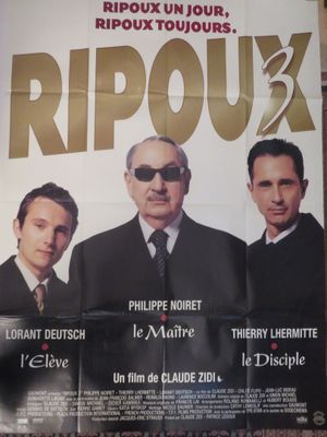 Affiche du film français « Ripouux », mettant en scène trois hommes en costume-cravate