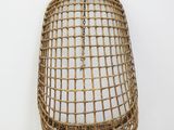 an image of a rattan hanging from a wall in a room