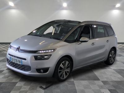 the silver citrole is parked on a checkered floor