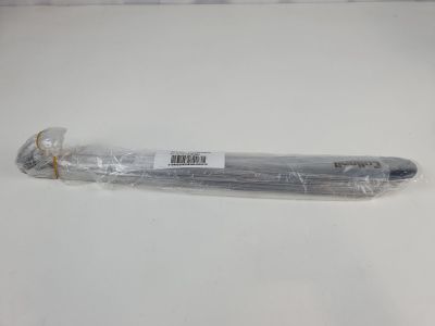 a pen that is wrapped in plastic on a table