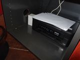 an image of a printer sitting on top of a cabinet