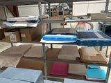 many boxes and boxes on the shelves in the room