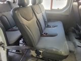 a picture of the inside of a vehicle with the seats down