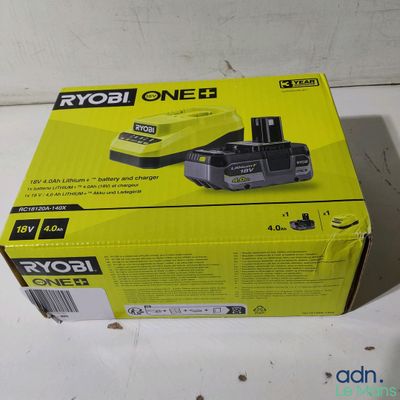 the box of the ryob one 2 battery is open on the table