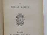 an open book with a picture of a coat of arms on it