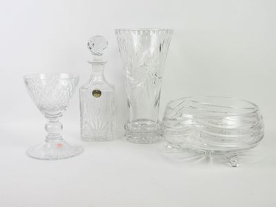 a lot of glass items that are sitting on a table
