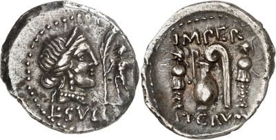 a silver coin with an image of a man and a woman on it