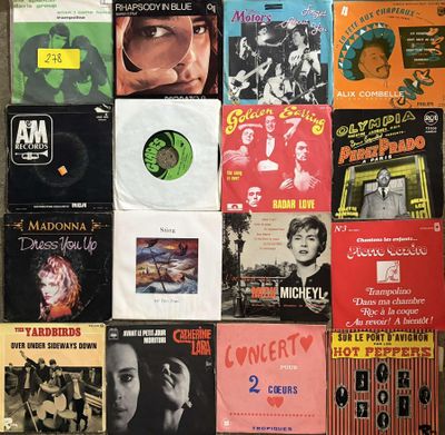 many different types of vinyl records on the wall
