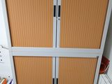 two doors that are open in a room