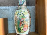 a vase that is sitting on a shelf in a room
