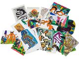 a pile of assorted art cards on a white surface