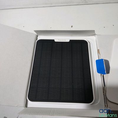 a small air conditioner in the corner of a room