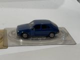 a toy car that is sitting on top of a plastic plate