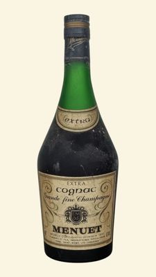 a bottle of wine that is sitting on a table
