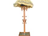 a lamp that is on a stand with a lamp shade on it