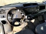 a dashboard of a car with a steering wheel and a dash board