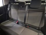 the back seats of a car with a seat belt in a car