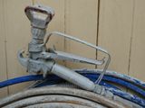 a hose attached to a hose with a wren on it