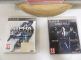 two video games sitting on a table next to each other