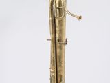 a brass plated musical instrument with a bell on a white background