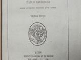 an old book with a picture of a seal on it