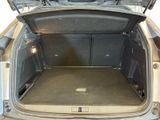a trunk of a car with the back door open