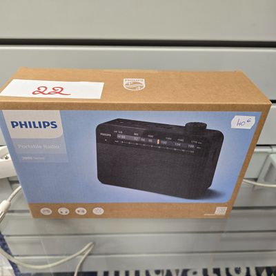l'emballage d'une radio Philips sur une étagère dans un magasin
