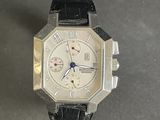 a close up of a wrist watch on a table