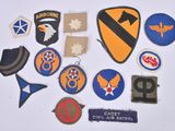 a lot of patches and patches on a white surface