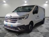 the white van is parked in a large room with checkered floor
