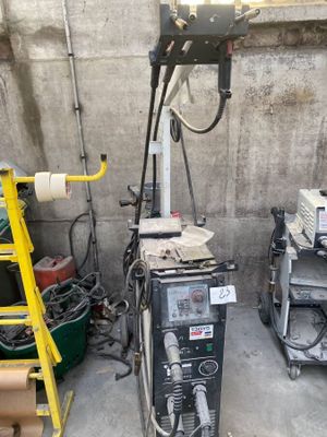 an image of a welding machine in a garage