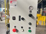 an image of a machine that is in a warehouse