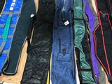 many different types of snowboards laid out on the floor