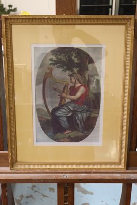 a picture of a picture of a woman playing a harp