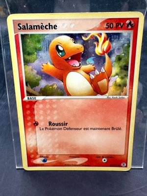 une image d'une carte Pokémon sur laquelle figure une flamme