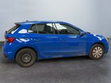 the rear of a blue car parked in a garage